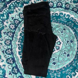 They have rips but they are made like that. Size 9. Good condition